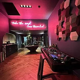 Red-lit lounge at an Oppenheim Group event