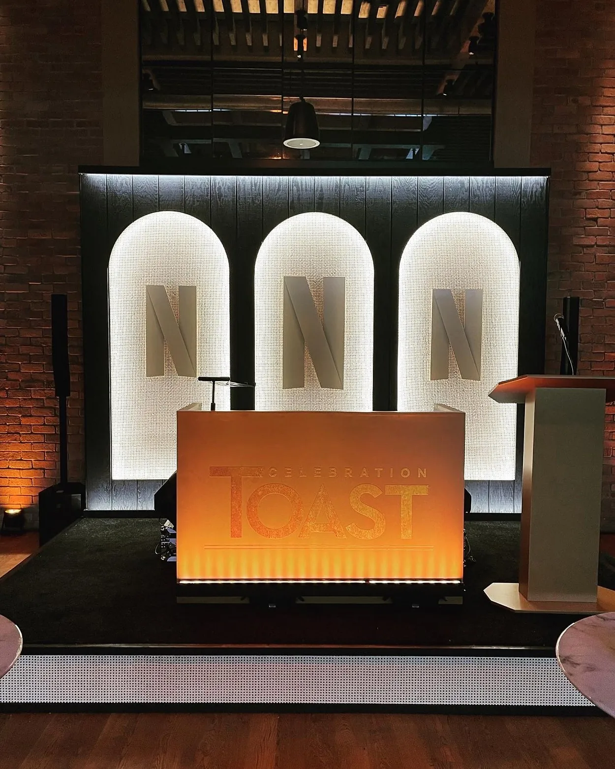 Arched stage for a Toast event at Catch