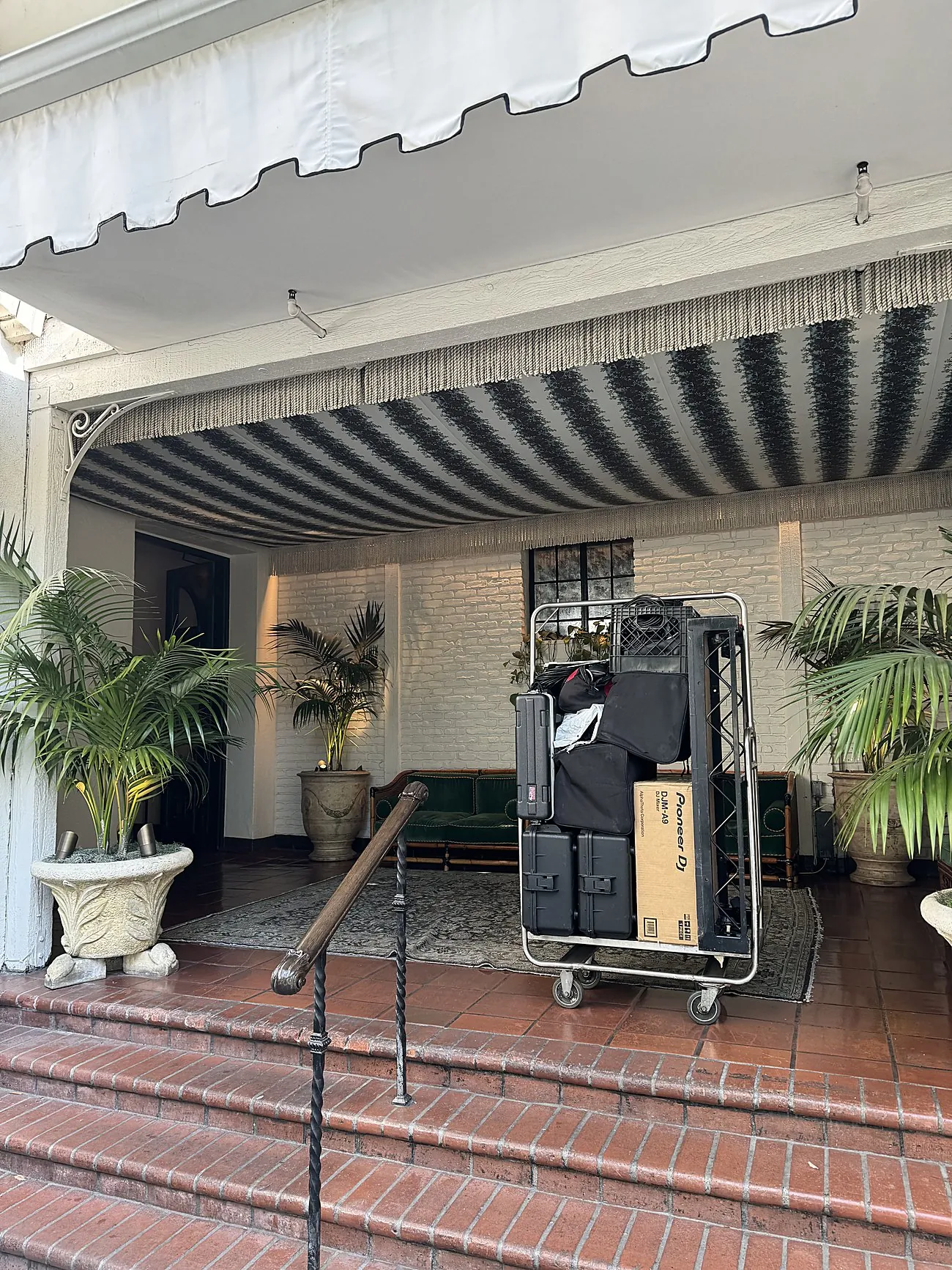 Load-in of AVE production gear on the terrace steps at the Chateau Marmont