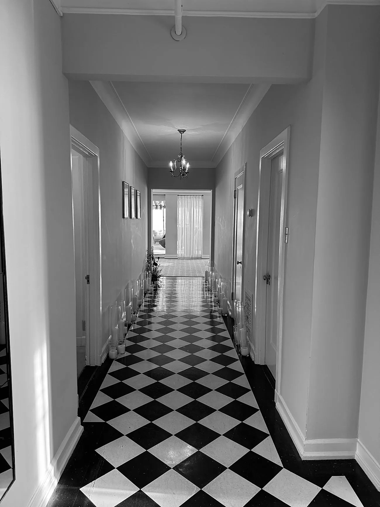 Iconic black-and-white checkerboard hallway at the Chateau Marmont