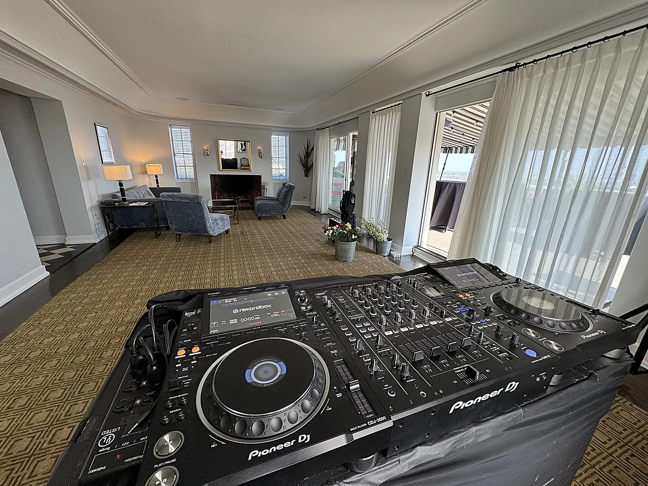 AVE DJ setup in a curtained suite at the Chateau Marmont