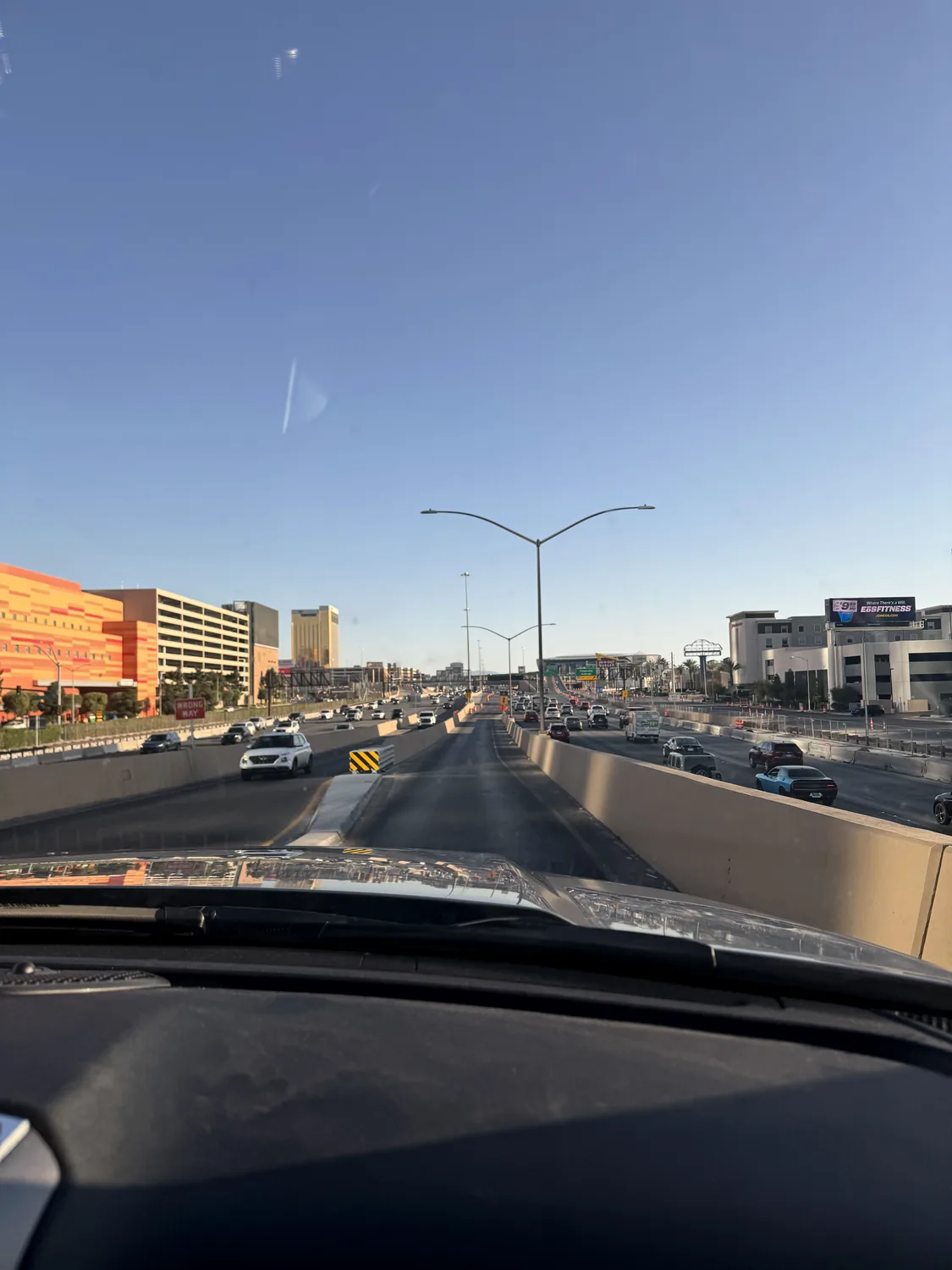 On the road to Las Vegas, the Strip ahead through the windshield